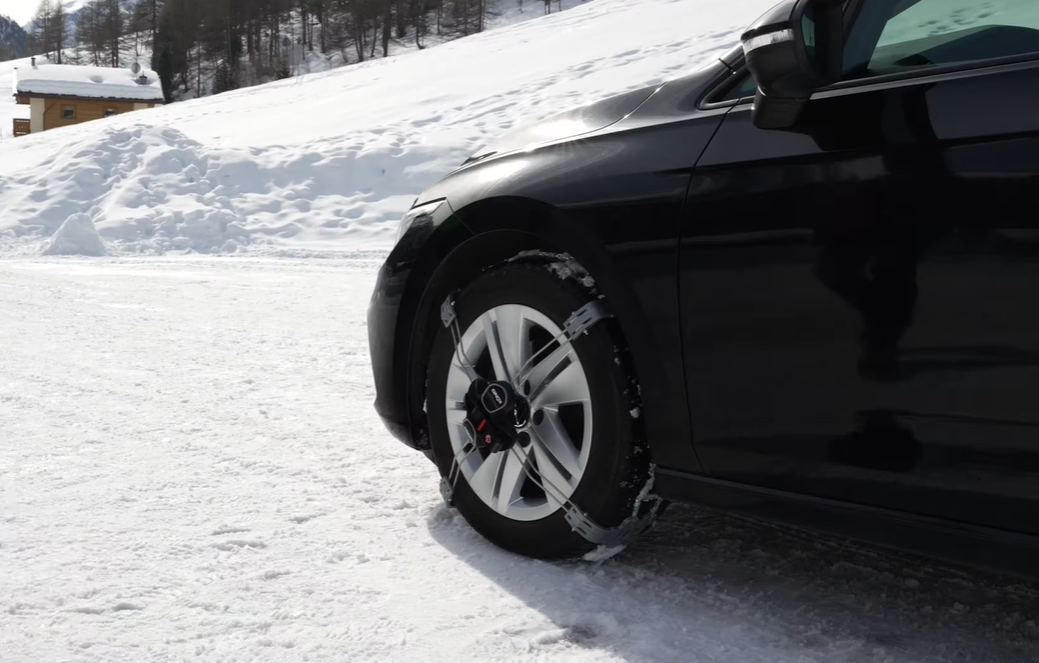 Konig K-Summit snow chain attached but not pulled-on under tyre yet